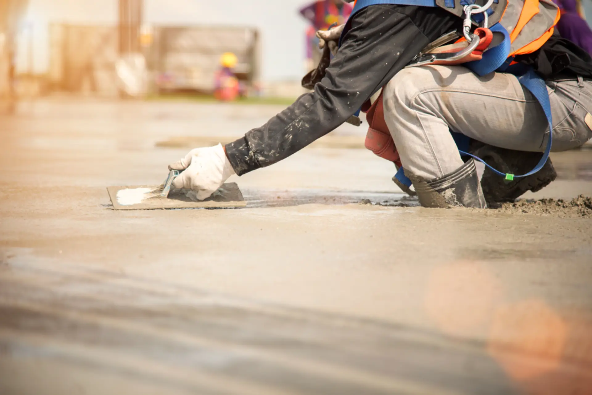 The cure line between wet and drying concrete across a fresh slab