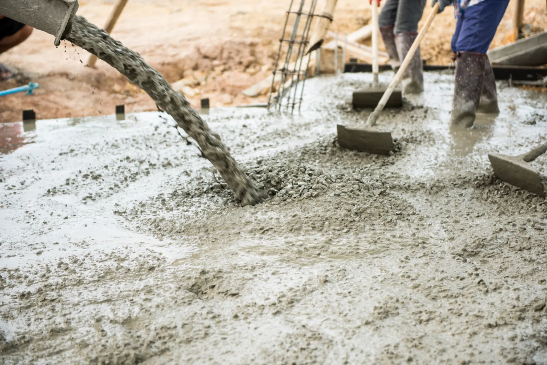 A mixer tipping concrete for a new garden path